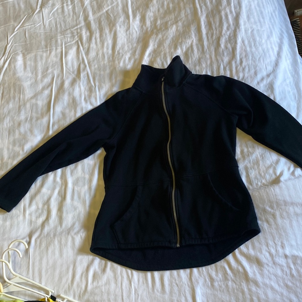 Black sketchers zip up coat